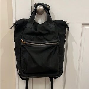 Stylish Black Backpack with Gold Accents